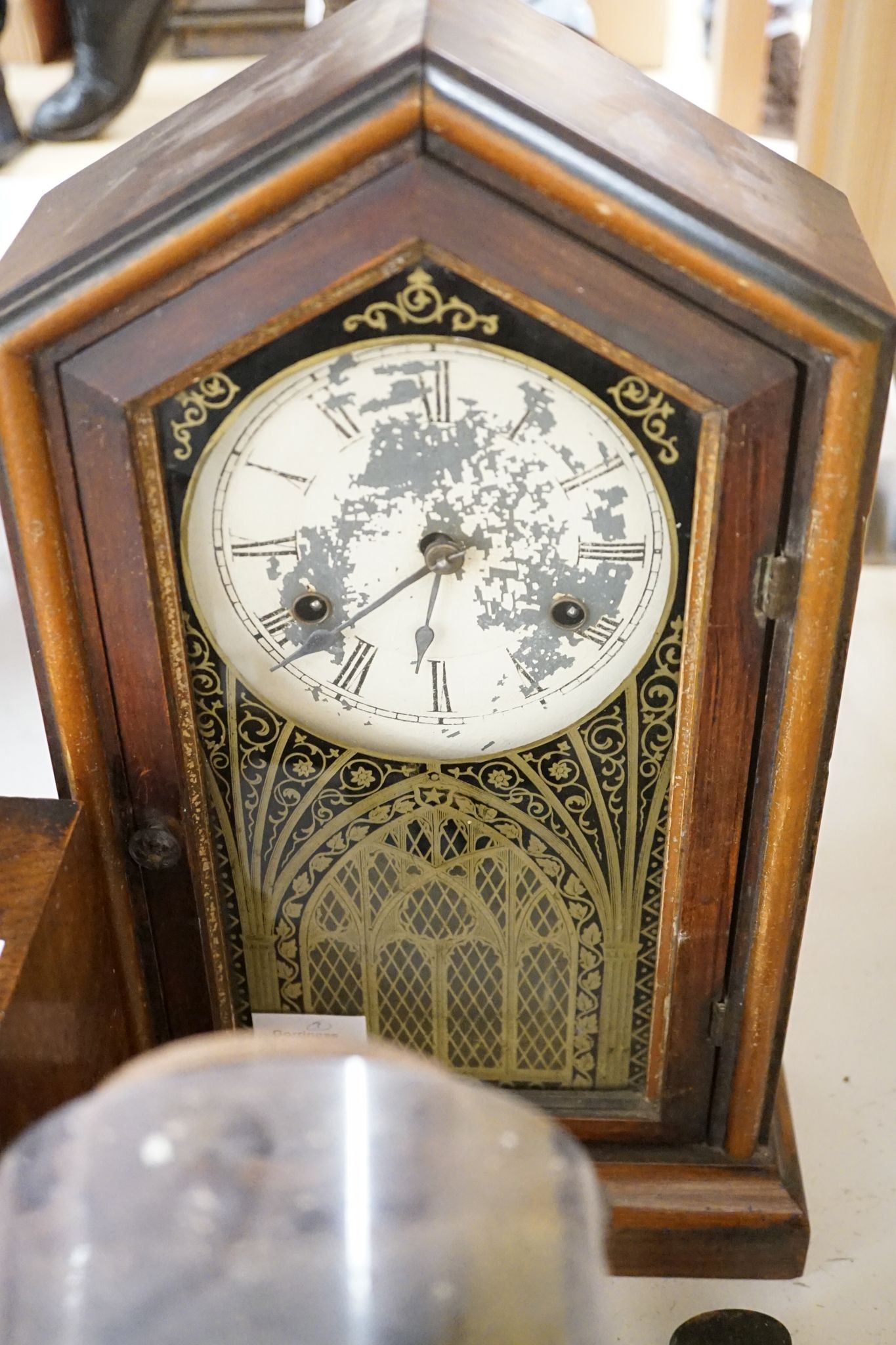 An early 19th century Dutch longcase timepiece movement, a late 29th century American shelf clock and a German mantel clock (3)